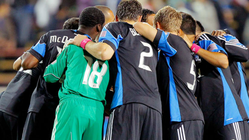 San Jose Earthquakes players huddle around before a match.