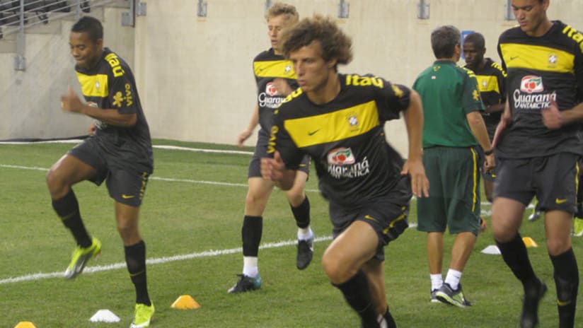 Robinho and David Luiz lead running drills at Brazil's first training session at the New Meadowlands Stadium