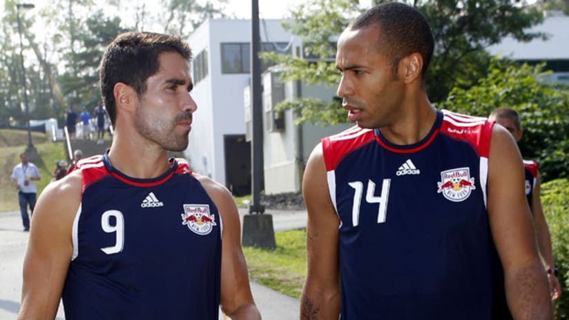 Thierry Henry gets the lay of the land from new teammate and fellow DP Juan Pablo Angel